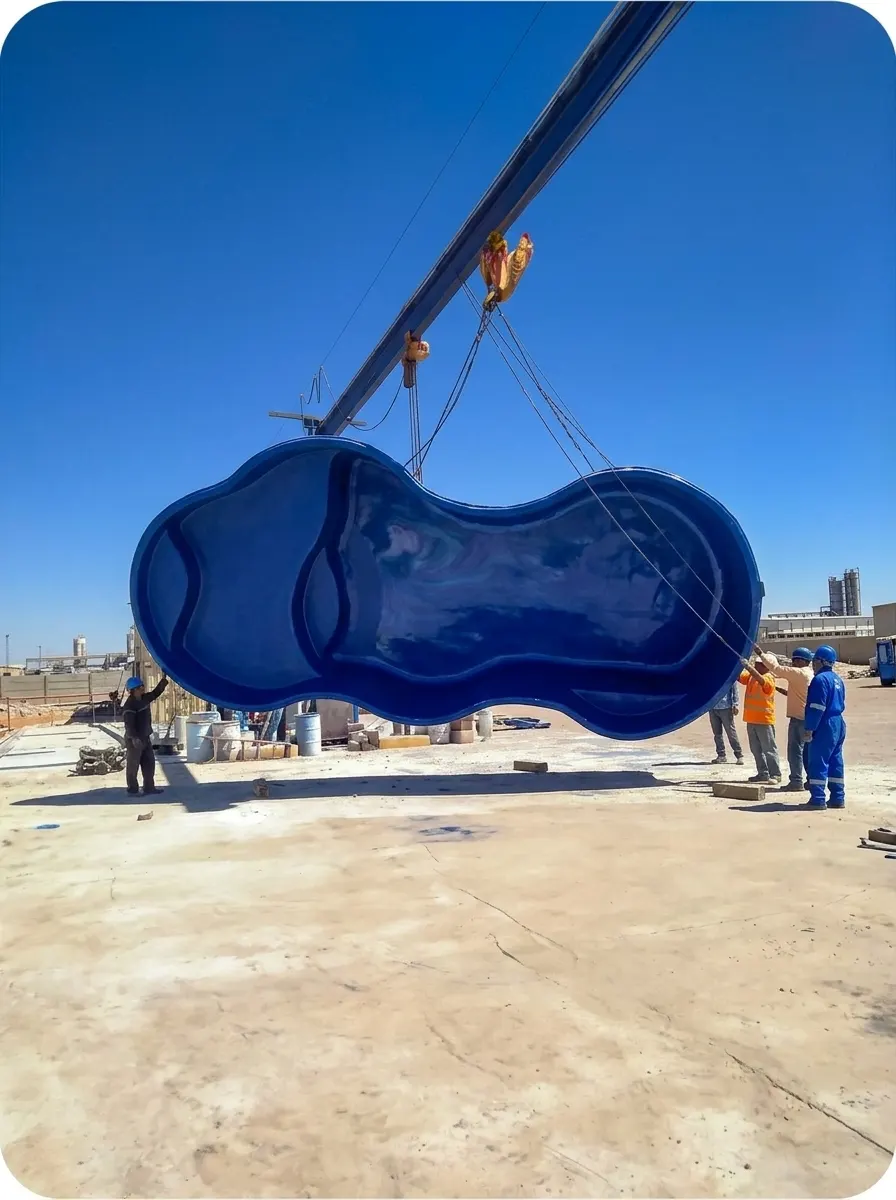 Fiberglass pool shell installation by Aquatic Services