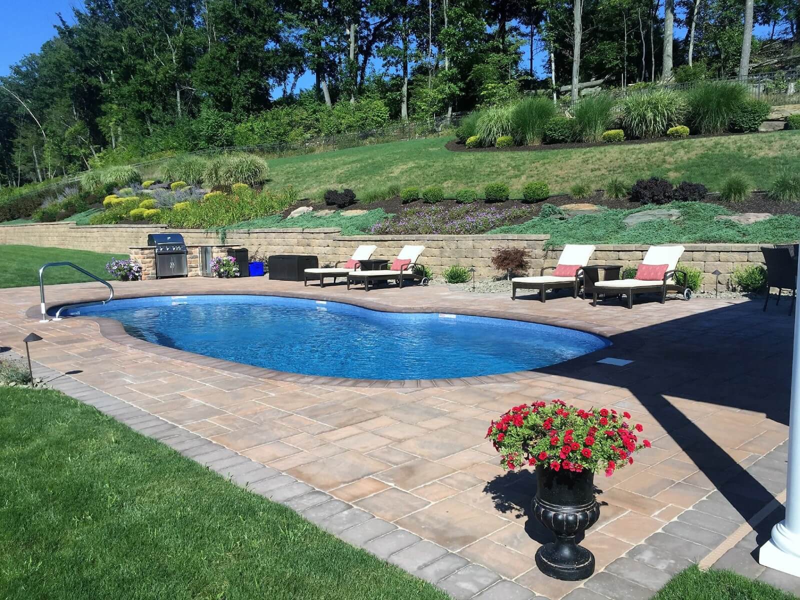 Inground fiberglass pool with patio